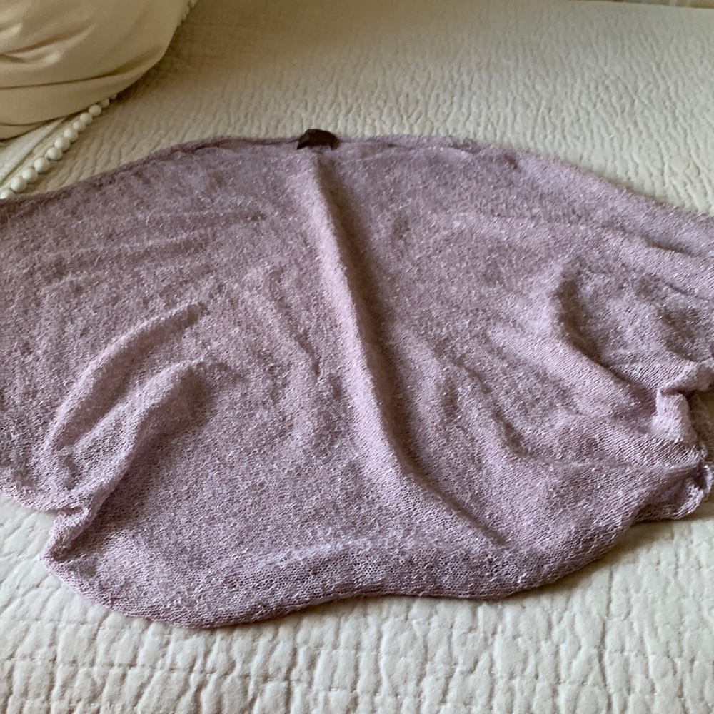 Kerisma shrug, loose fitting, poncho style.